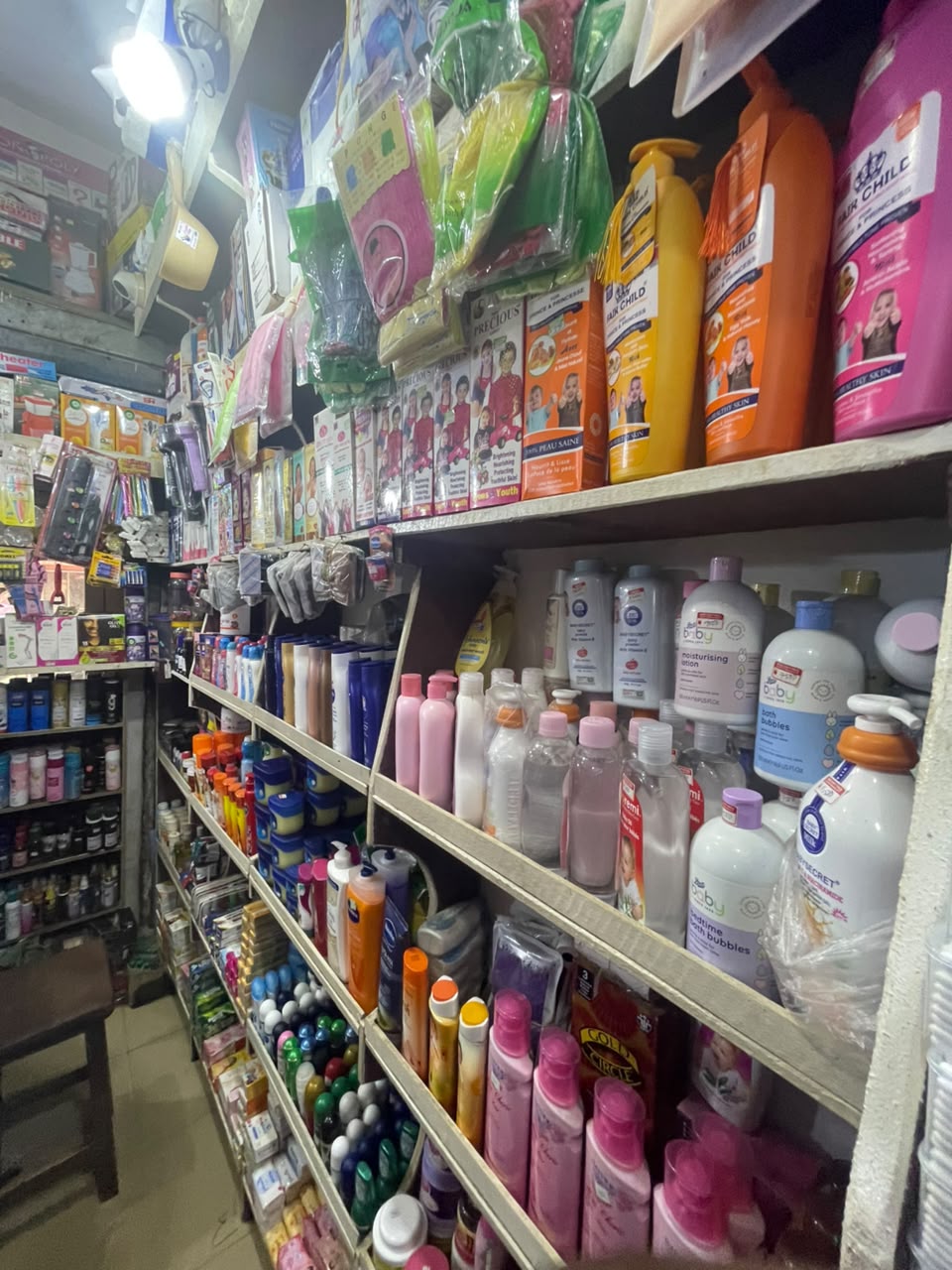 Shelves of lotions, soaps and baby toiletries